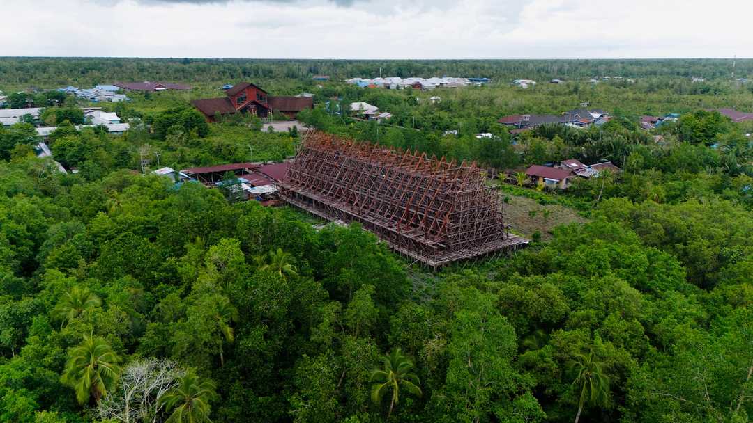 Ironwood posts and trusses of the new Cathedral of the Holy Cross seen from the air, before the roof battens